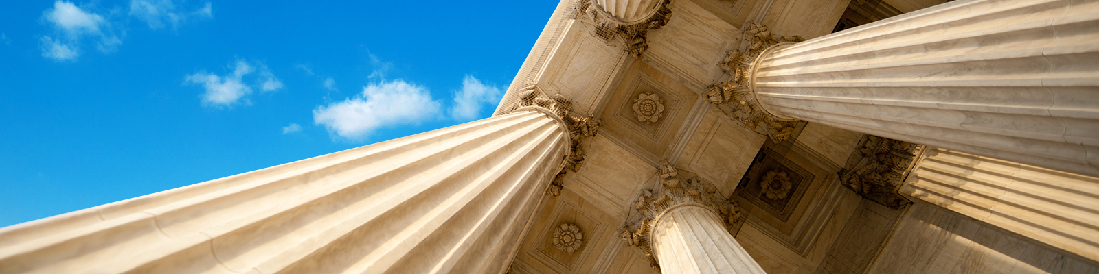 Upward view of grand marble columns