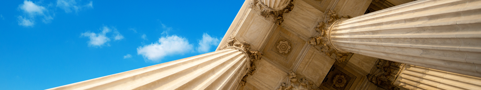 Upward view of grand marble columns